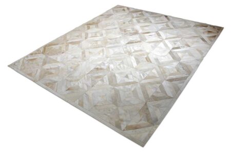 Beige cowhide patchwork rug in diamond design Beige cowhide patchwork rug in diamond design