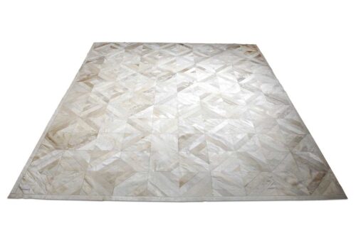 Beige patchwork cowhide rug in diamond design