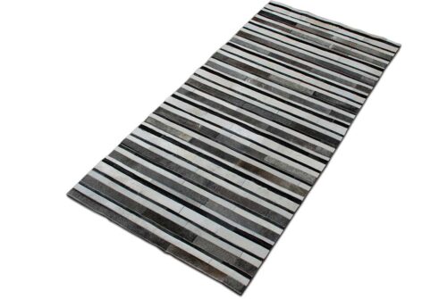 White, gray and black leather area rug in stripes
