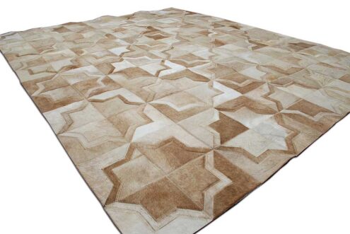 Beige cowhide patchwork rug in the Moorish Star design Beige cowhide patchwork rug in the Moorish Star design