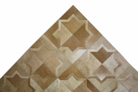 Beige Patchwork Cowhide Rug in a Moorish Star Design Beige Patchwork Cowhide Rug in a Moorish Star Design