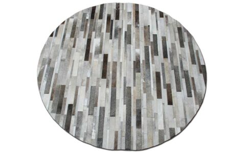 Round taupe gray cowhide patchwork rug in Stripes Round taupe gray cowhide patchwork rug in Stripes