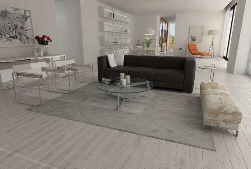 Chevron gray cowhide patchwork rug in a minimal living room