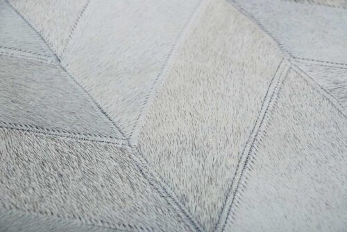Detail of a Gray Chevron leather area rug