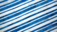 Detail of Blue and white cowhide patchwork rug in stripes design