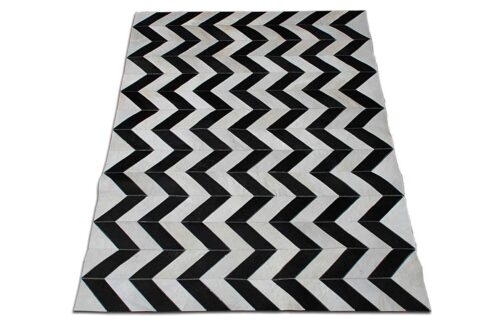 Black and white chevron patchwork cowhide rug
