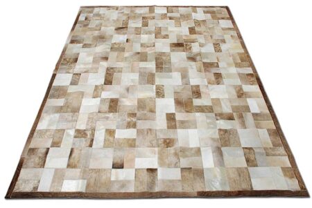 Beige and white patchwork cowhide rug in bricks design with border Beige and white patchwork cowhide rug in bricks design with border