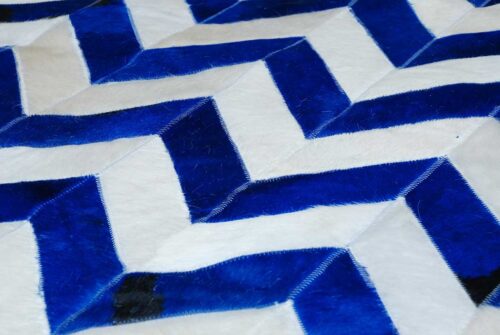 close up of our Chevron blue and white cowhide patchwork rug