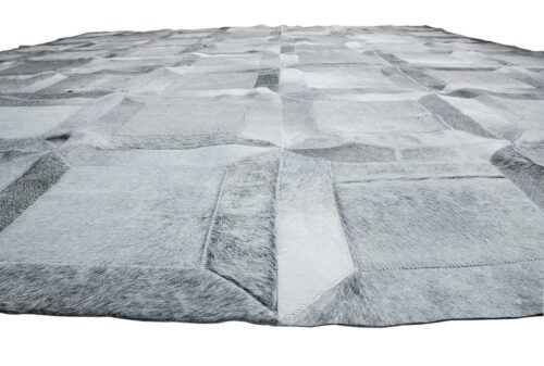 View of a gray Cube patchwork cowhide rug