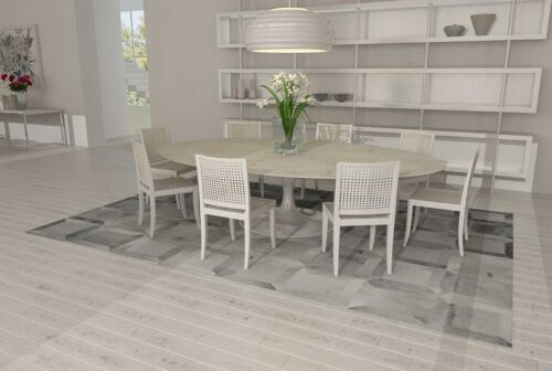 Gray Cube patchwork cowhide rug in a white dining room