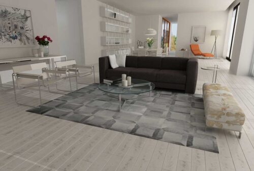 Gray Cube patchwork cowhide rug in a minimal living room
