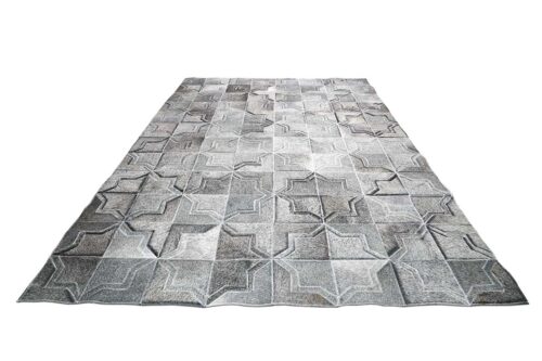 Dark gray leather area rug in a moorish star design