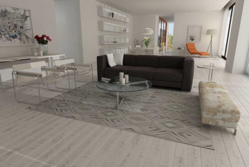 Diamond gray cowhide patchwork rug in a minimal living room