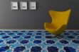 Moorish Star Blue and White Leather Area Rug with a modern Egg chair and dark walls