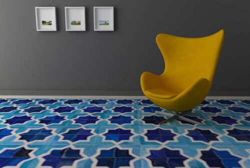 Moorish Star Blue and White Leather Area Rug with a modern Egg chair and dark walls