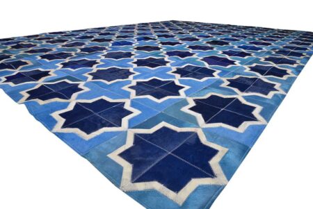 Close up of our Moorish Star Blue and White cowhide patchwork rug Close up of our Moorish Star Blue and White cowhide patchwork rug
