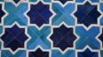 Top detail of our Moorish Star Blue and White cowhide patchwork rug