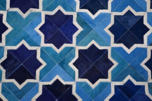 Top detail of our Moorish Star Blue and White cowhide patchwork rug