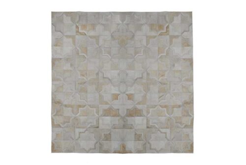 White patchwork cowhide rug in moorish star design