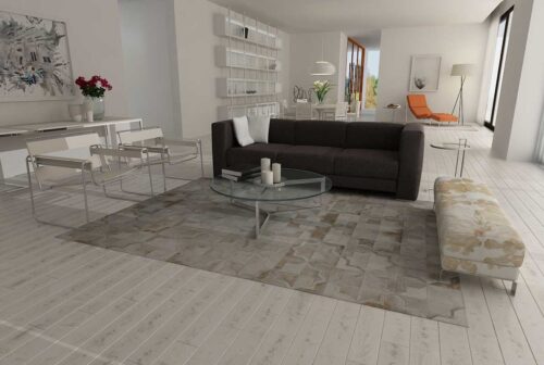 White patchwork cowhide rug in moorish star design in minimal living room