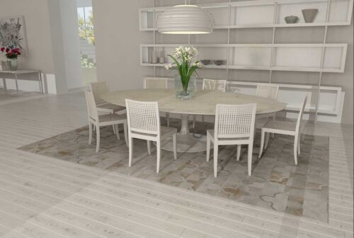 White patchwork cowhide rug in moorish star design in clean dining room