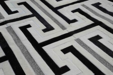 Black, gray and white patchwork cowhide rug design Black, gray and white patchwork cowhide rug design
