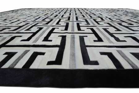 Black, gray and white patchwork cowhide rug design Black, gray and white patchwork cowhide rug design