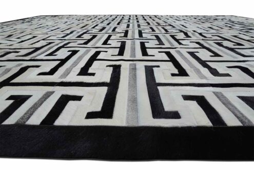 Black, gray and white patchwork cowhide rug design Black, gray and white patchwork cowhide rug design