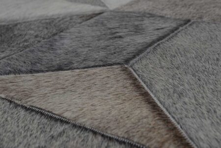 Detail of Taupe Gray Envelope Patchwork Cowhide Rug Detail of Taupe Gray Envelope Patchwork Cowhide Rug