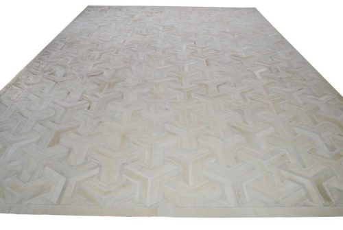 White TOTO cowhide patchwork rug