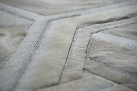 Zoom into white patchwork cowhide rug Zoom into white patchwork cowhide rug