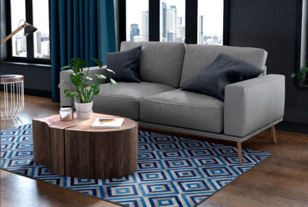 Patchwork cowhide rug, wooden floor Patchwork cowhide rug, wooden floor