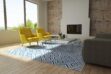 Patch Cowhide Rug in our Grey and Blue Diamond Design in a shiny living room