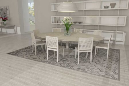 Full Gray Patchwork Cowhide Rug in a white dining room Full Gray Patchwork Cowhide Rug in a white dining room