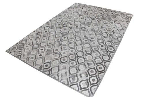 Gray and white cowhide patchwork rug