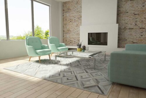Bright living room in aqua with a Taupe and Cream Diamond Patchwork Cowhide Rug
