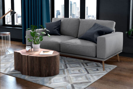 Living room with a Diamond cowhide Patchwork Rug in gray and taupe Living room with a Diamond cowhide Patchwork Rug in gray and taupe