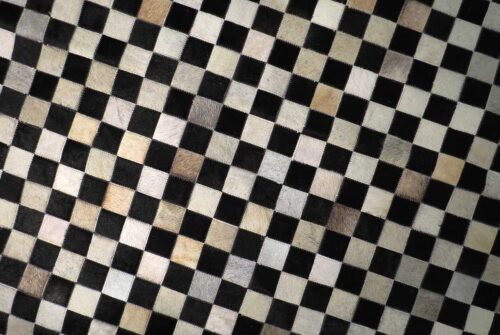 Detail of our black and beige Checkerboard patchwork cowhide rug