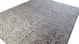 White, grey and taupe cowhide patchwork rug