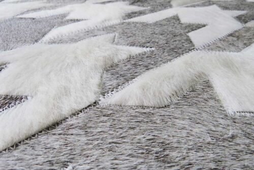 Close Up of our White and Beige Leather Area Rug Houndstooth Design