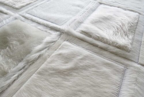 Detail of our White Mona Patchwork Cowhide Rug