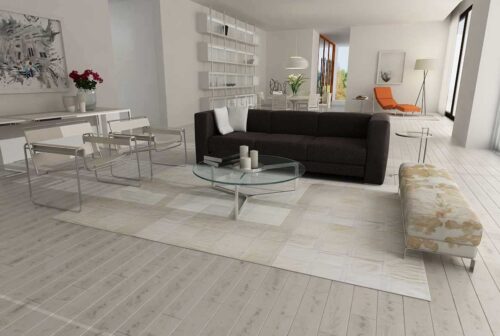 White Mona Patchwork Cowhide Rug in spacious living room
