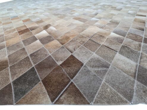 Perspective view of LIME Ombre Taupe Patch work Cowhide Rug Perspective view of LIME Ombre Taupe Patch work Cowhide Rug