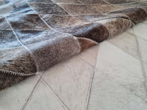this Taupe Ombre Cowhide Rug in small Rhombus Patches will transform your home completely
