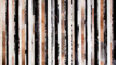Black, beige and black with salt and pepper cowhide patchwork rug in stripes