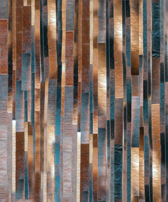 Brown patchwork cowhide rug in stripes