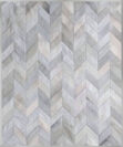 Gray cowhide patchwork rug in a chevron design