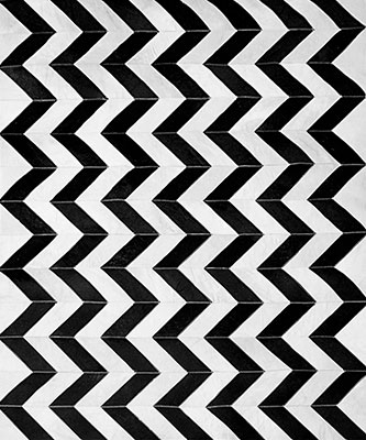Black and white chevron patchwork cowhide rug