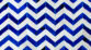 Blue and white cowhide patchwork rug in a chevron design
