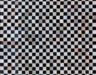 Alfombra de piel de vaca patchwork damero